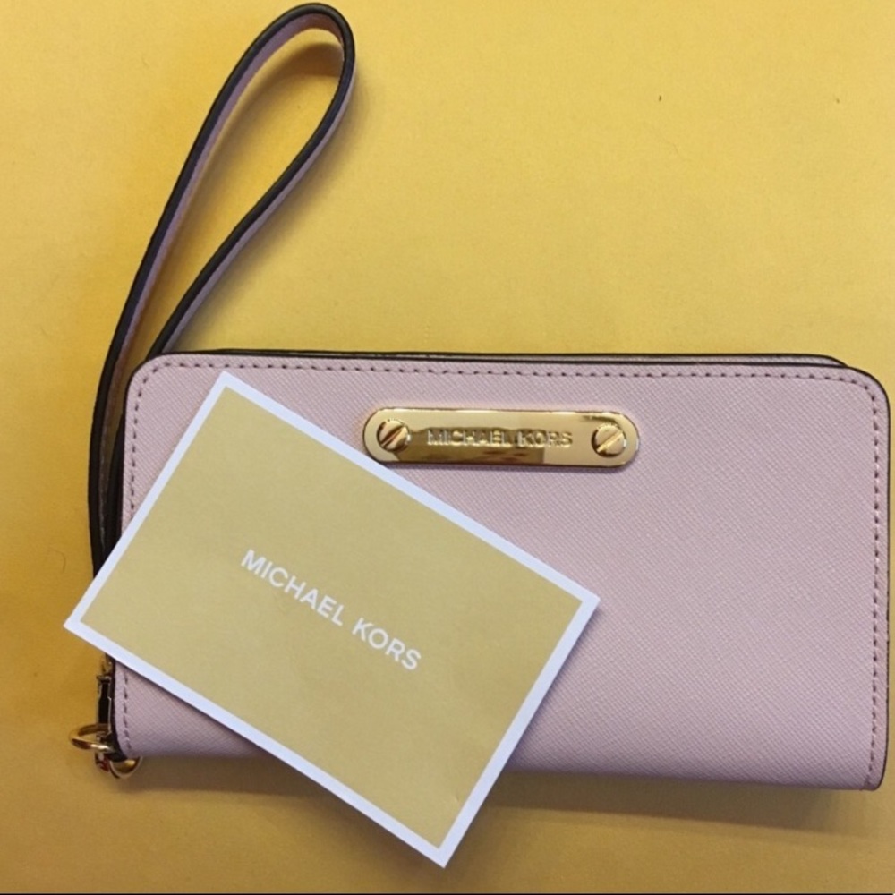 Never worn MK pink wristlet
